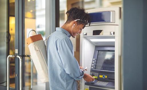 A man using an ATM